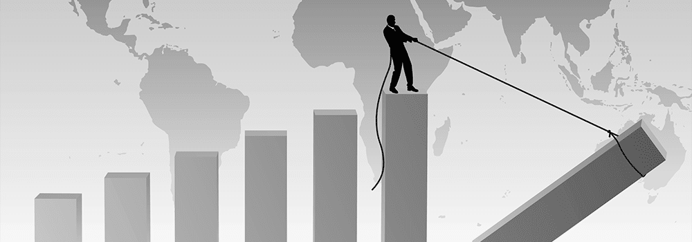 Man on a cube stair rise holding up the next stair in front of world map